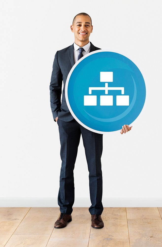 Businessman holding a business chart icon