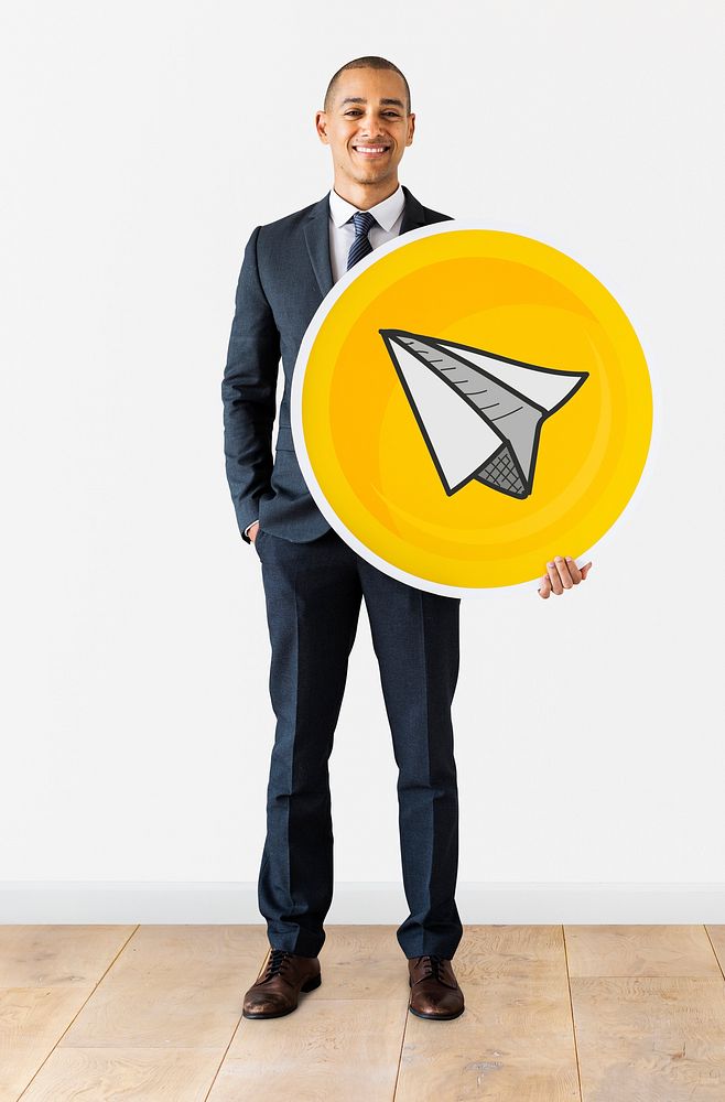 Businessman with a paper plane icon