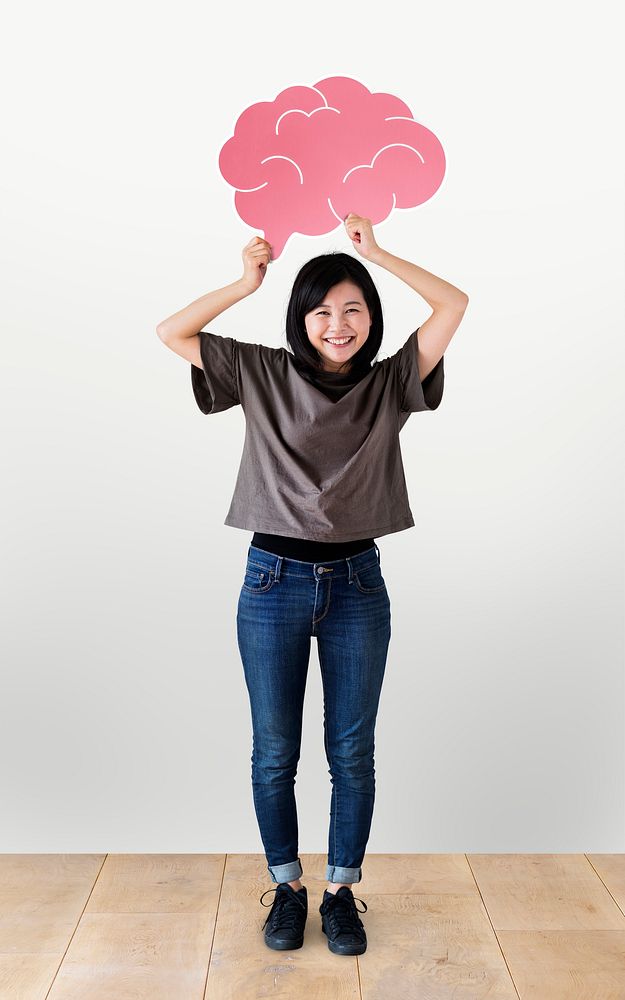 Cheerful woman holding a brain icon
