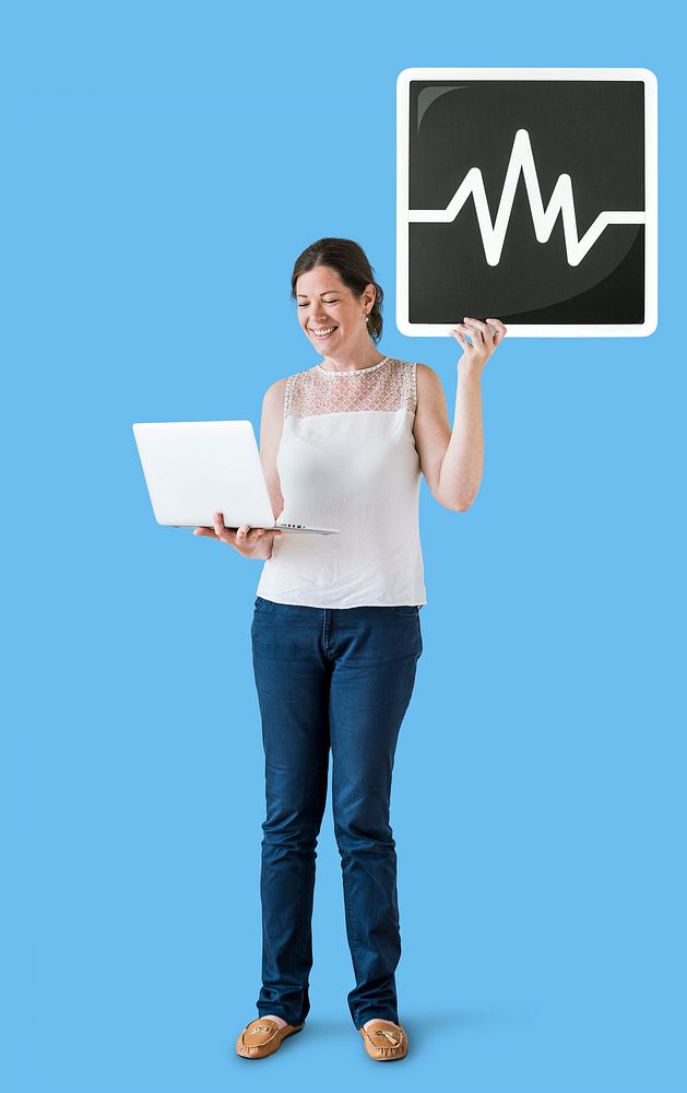 Woman holding a frequency icon and a laptop