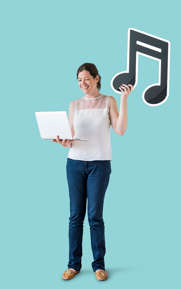 Woman holding a musical note and a laptop
