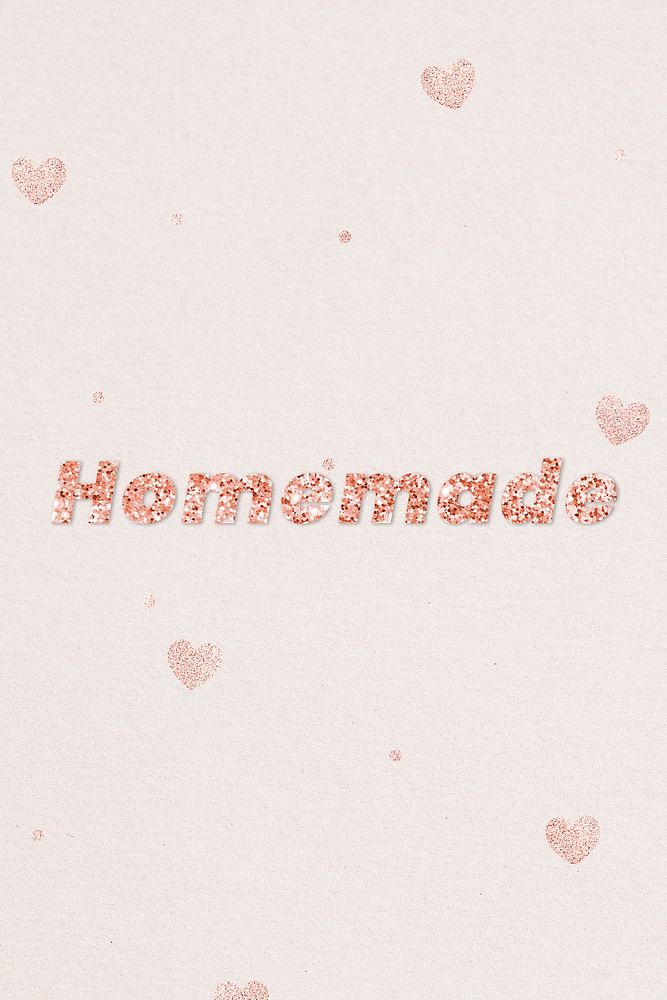 Glittery homemade typography on heart patterned background