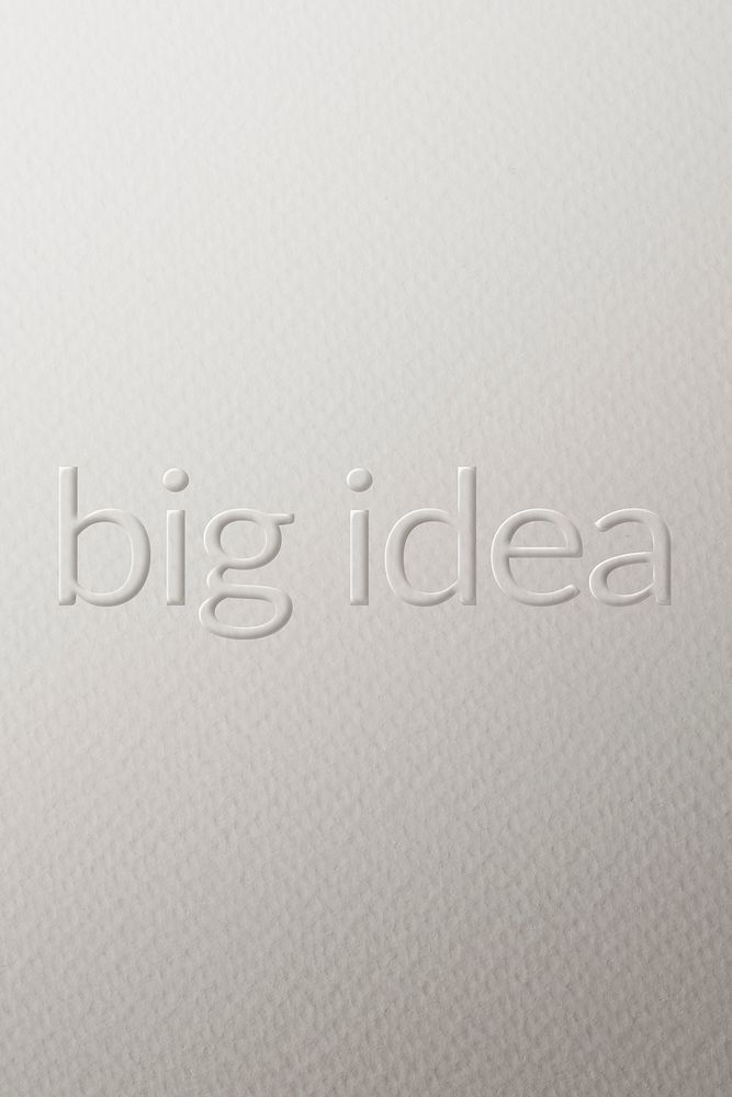 Big idea embossed text white paper background