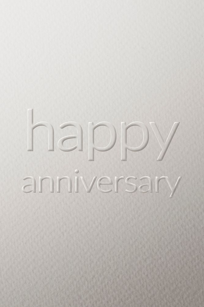 Happy anniversary embossed font white paper background