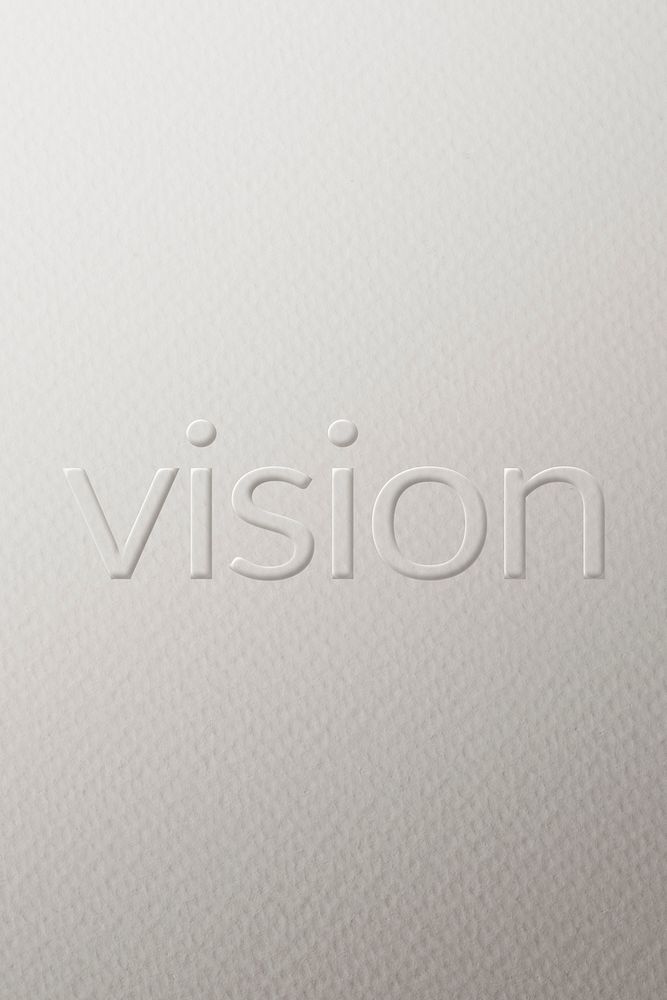 Vision embossed font white paper background