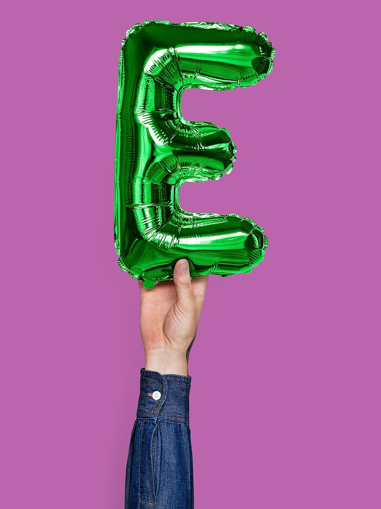 Hand holding balloon letter E