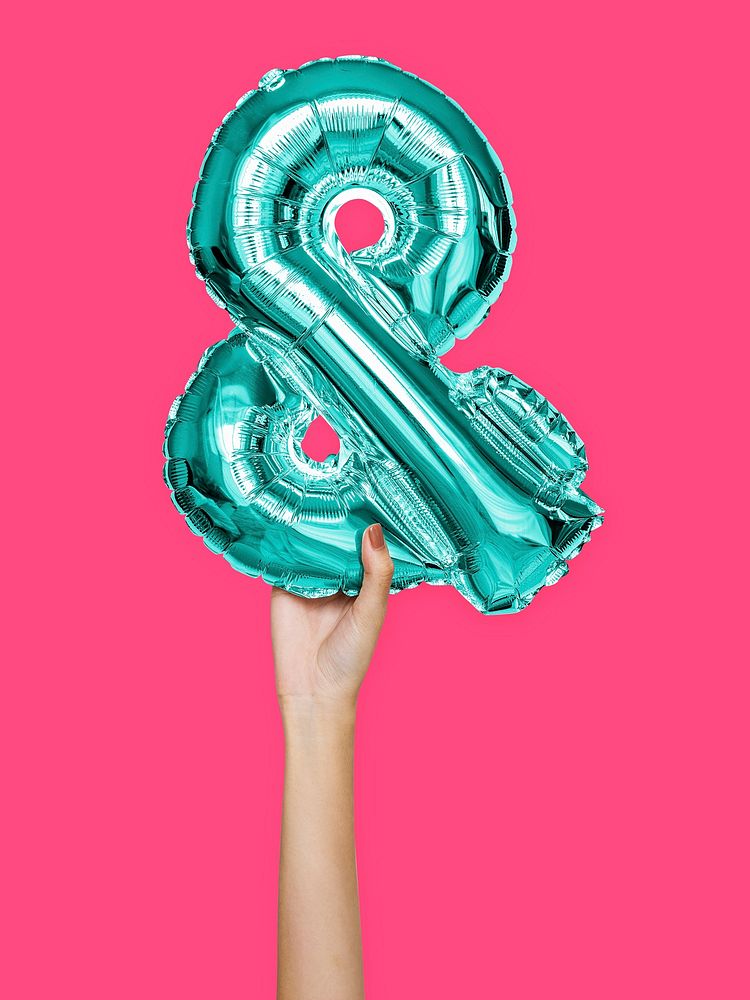 Hand holding balloon and symbol &