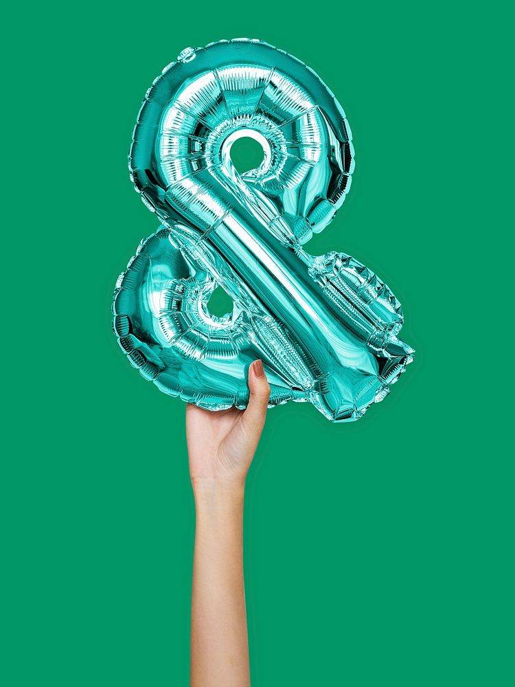 Hand holding balloon and symbol &