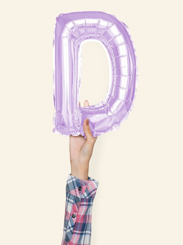 Hand holding balloon letter D