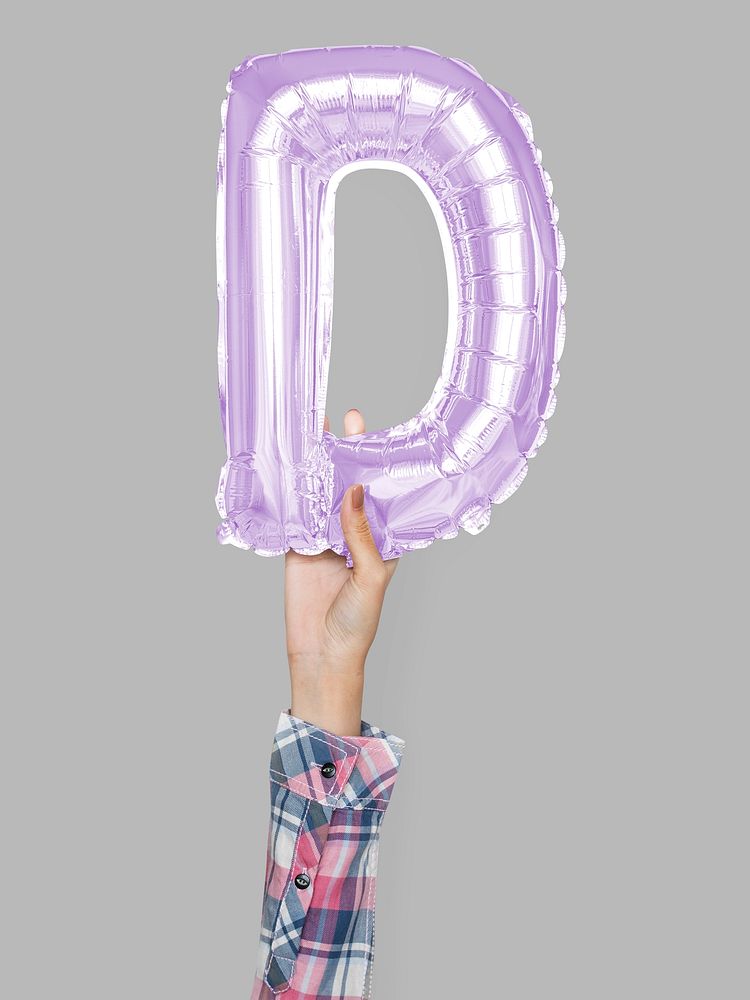 Hand holding balloon letter D