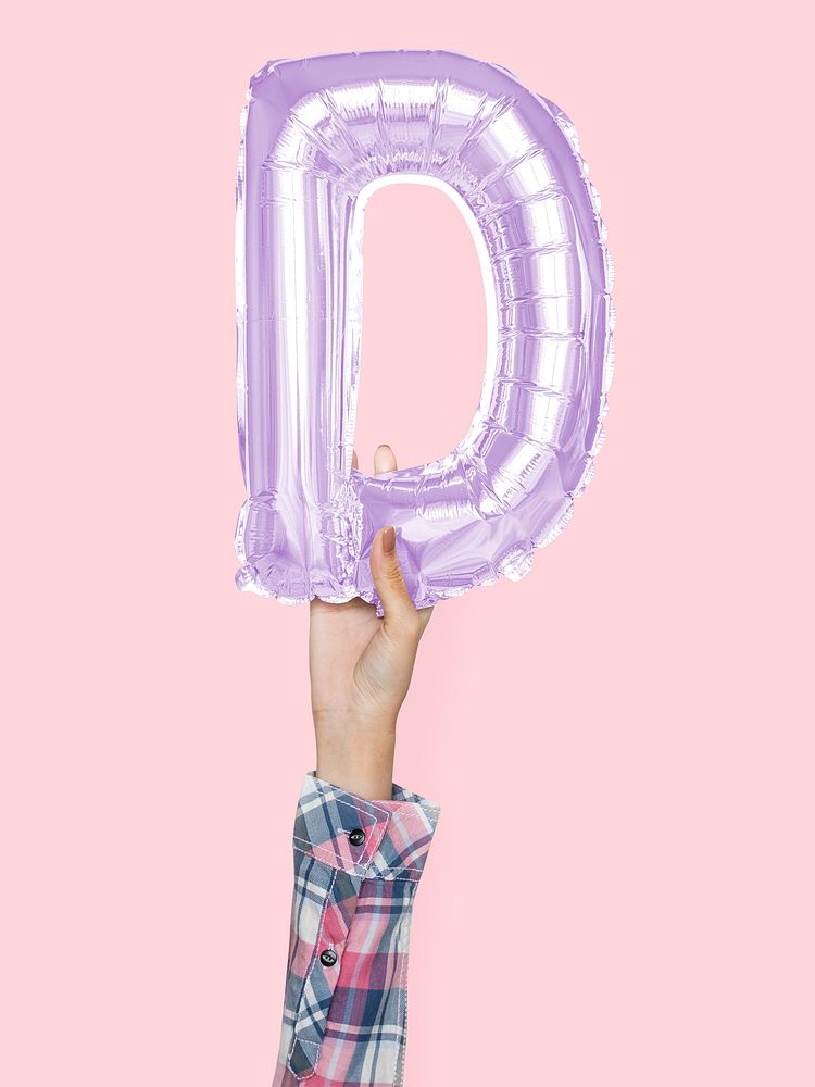 Hand holding balloon letter D