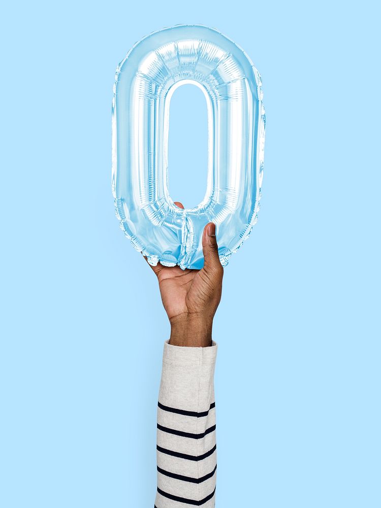 Hand holding balloon letter O