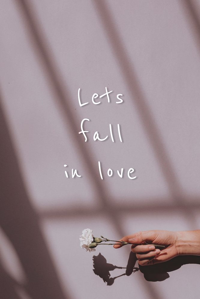 Let's fall in love quote on a natural light background