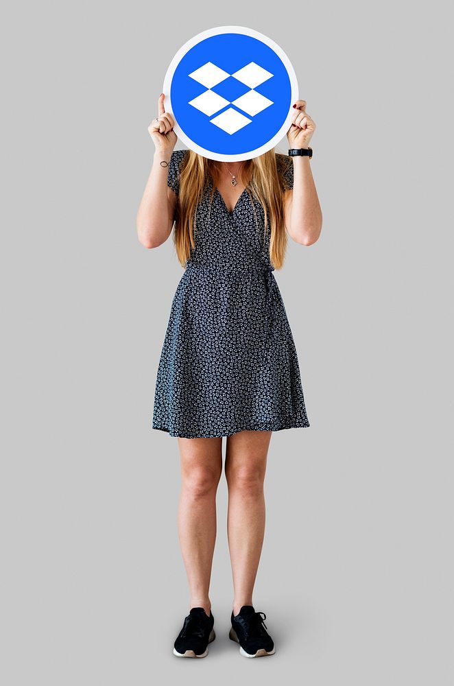 Person holding up a Dropbox logo isolated