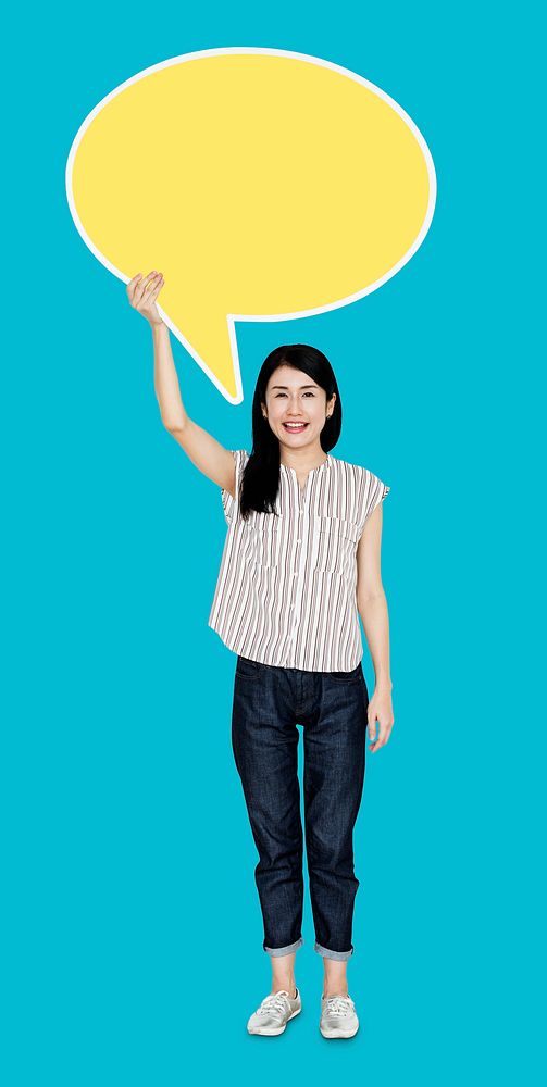 Woman holding a blank yellow speech bubble icon