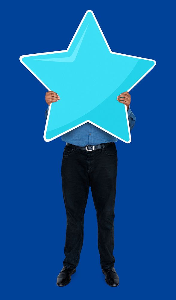 Businessman showing a star rating symbol