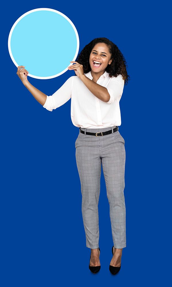 Young businesswoman holding a blank circle