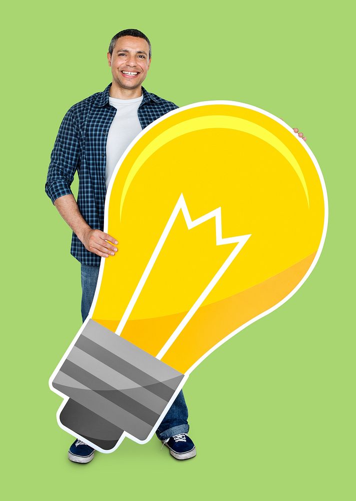 A man holding a light bulb