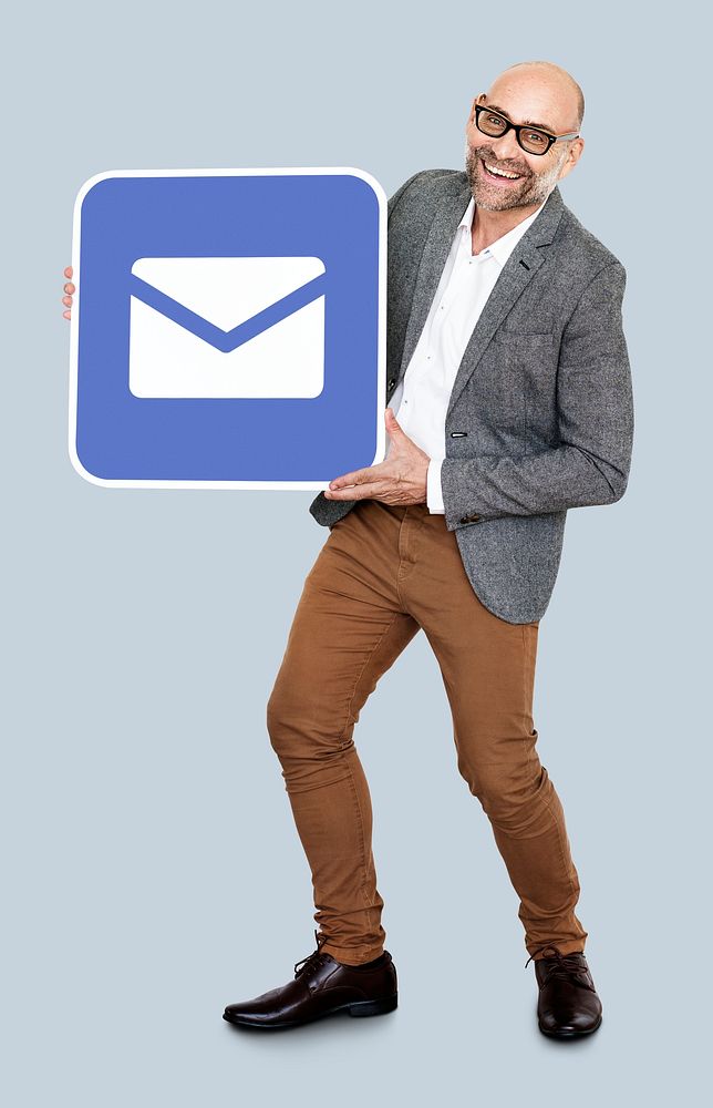 Mature man holding an email icon