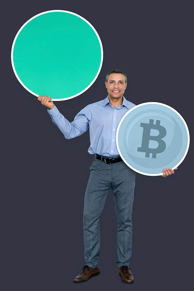 Happy businessman earning bitcoin currency