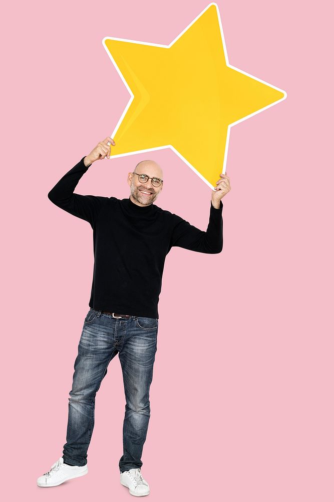 Happy man with a big star icon