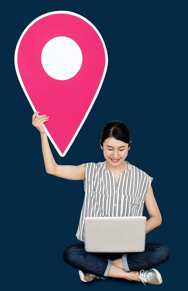 Woman holding a location pin symbol