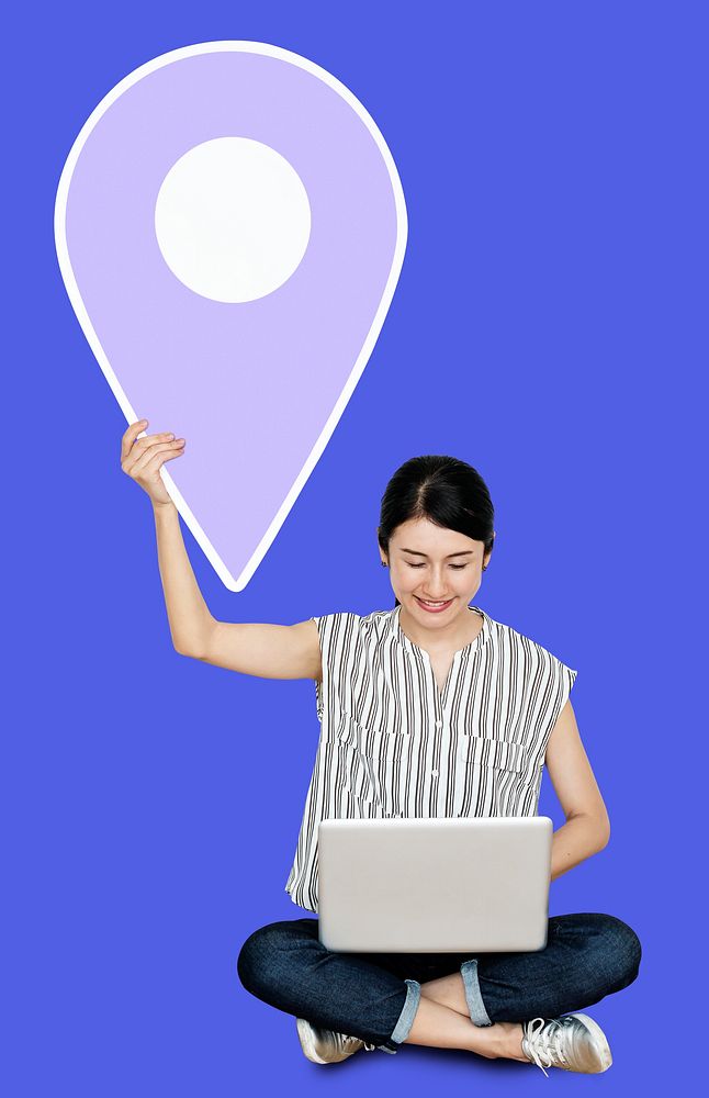 Woman holding a location pin symbol