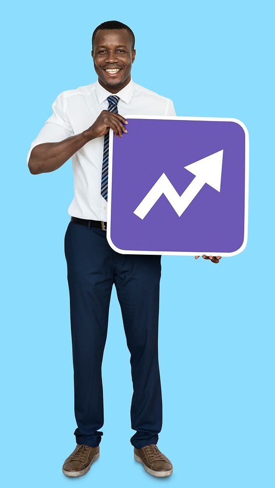 Man holding a growth indicating arrow