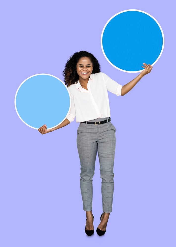 Woman showing blank blue circle boards