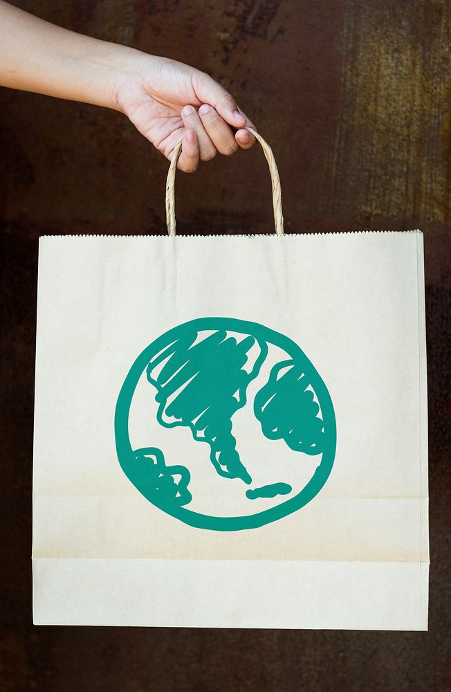 Green globe drawing on a paper bag
