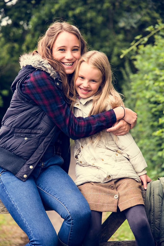 Sister Hug Togetherness Outdoors Girls Concept