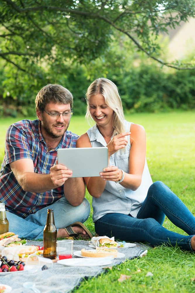 People Picnic Togetherness Relaxation DIgital Tablet Technology Concept