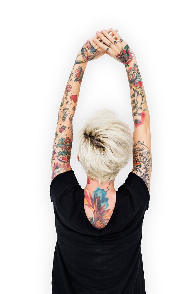 Rear view of tattooed woman in black tee