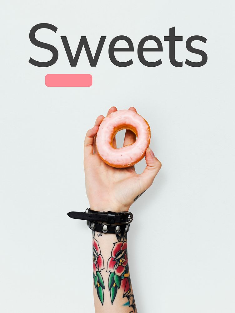 Hand holding sweet dessert donut pastry