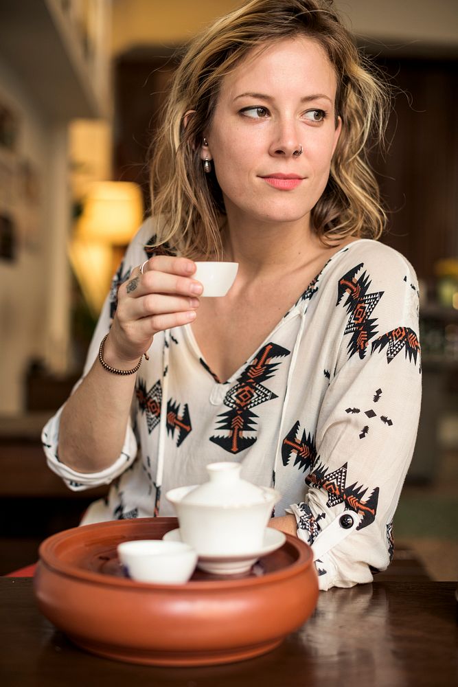 Caucasian woman drinking tea
