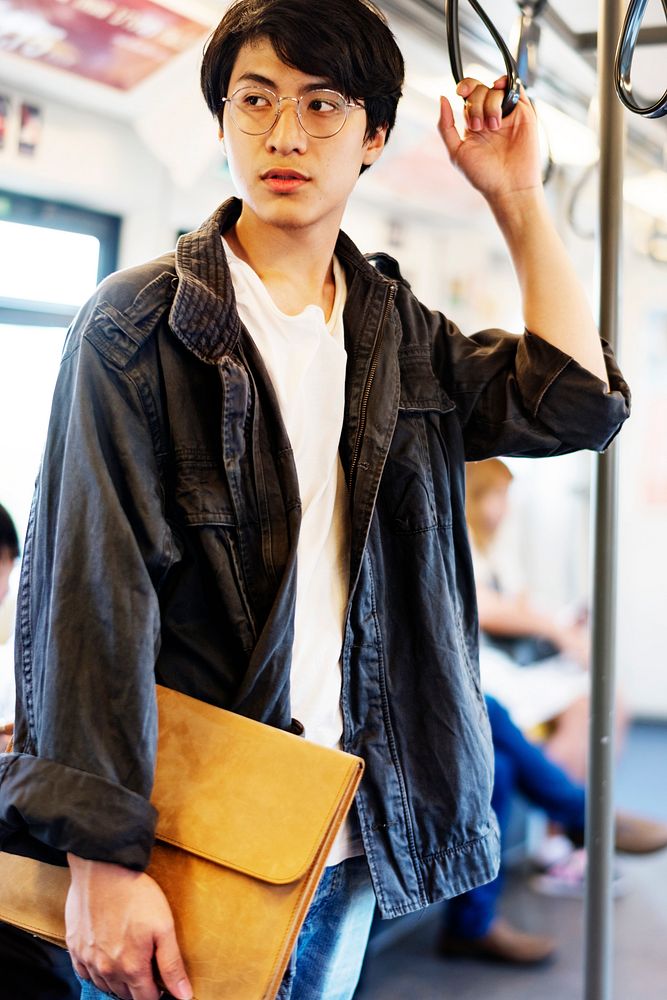 Asian Guy Stand Bus Public Transportation