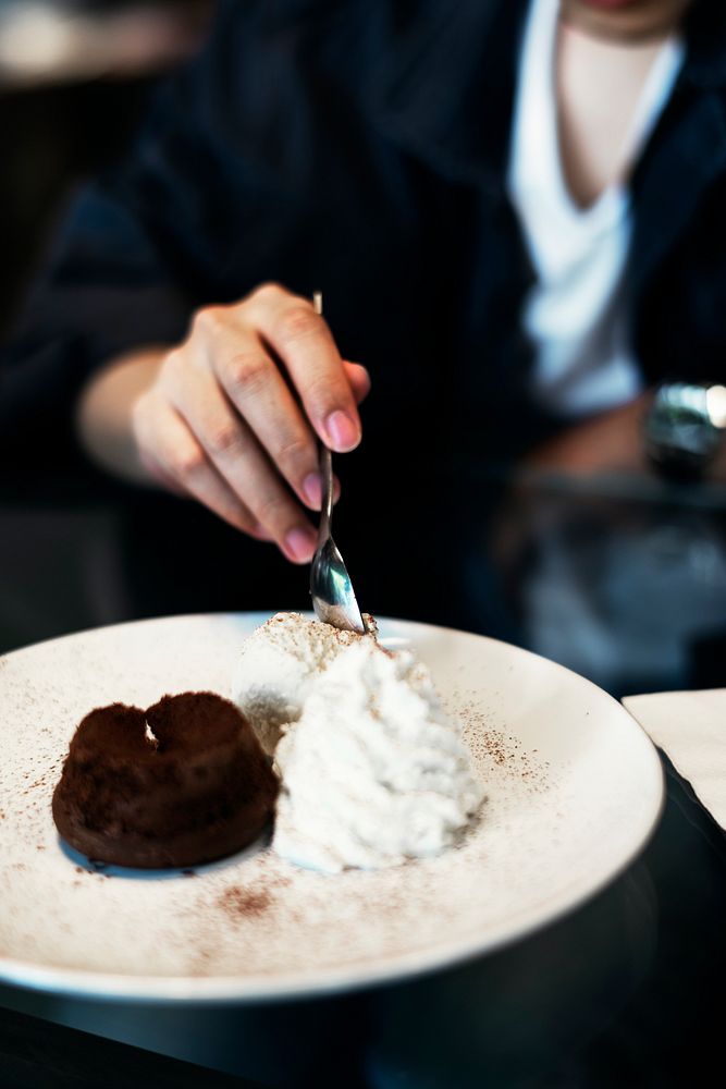 Chocolate lava cake with ice cream and whip cream sweet dessert