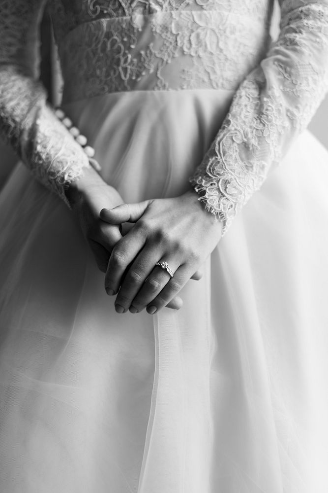Attractive Beautiful Bride Showing Engagement Wedding Ring on Hand