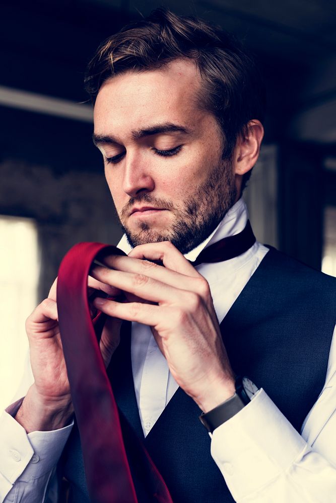 Handsome Groom Dressing Up for Wedding Ceremony