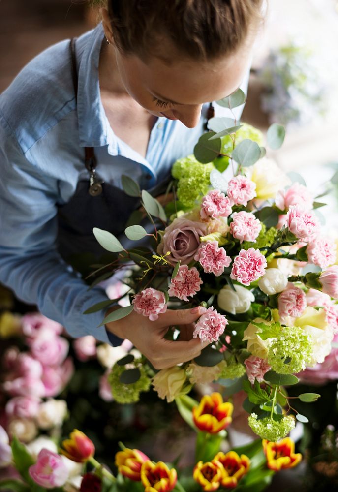 Close up florist flower arrangement skill