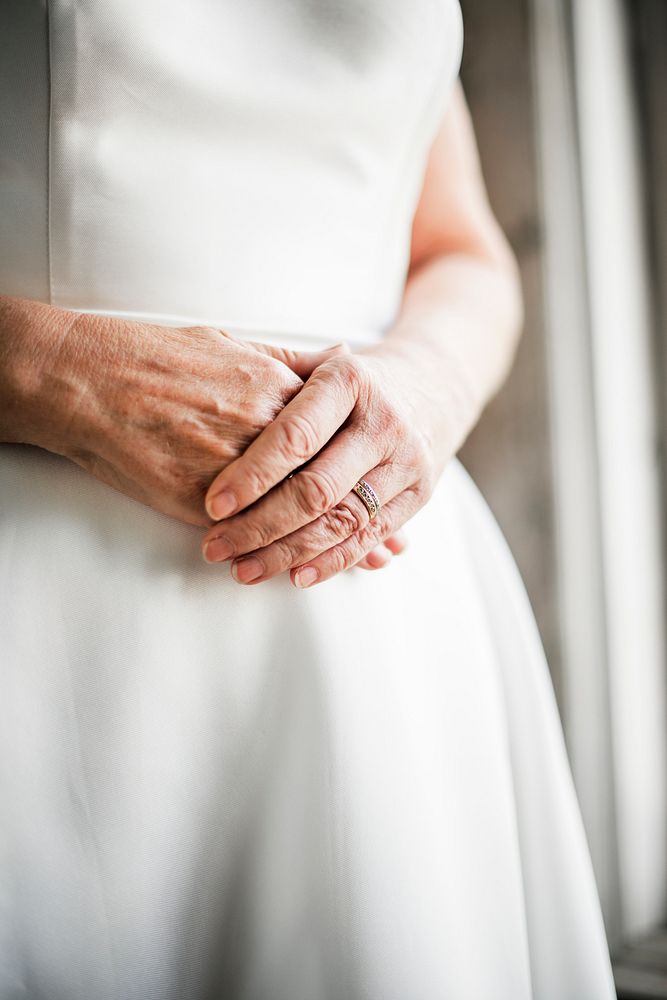 Closeup woman hands with wedding ring