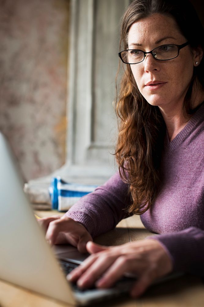 Caucasian woman using computer laptop