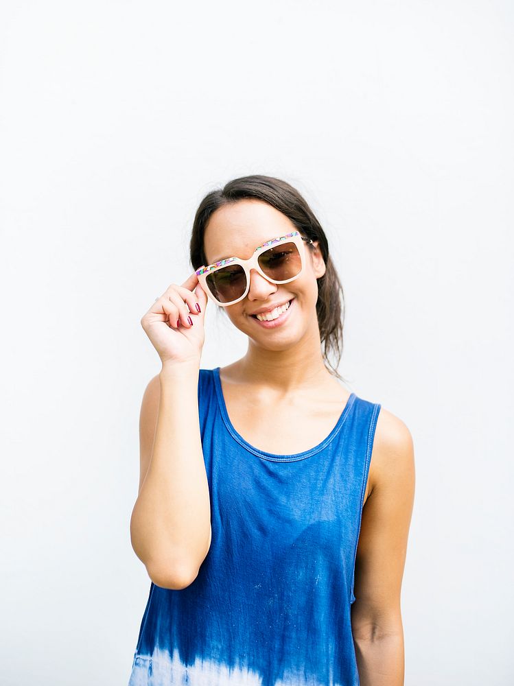 Portrait of asian woman smiling wearing sunglasses