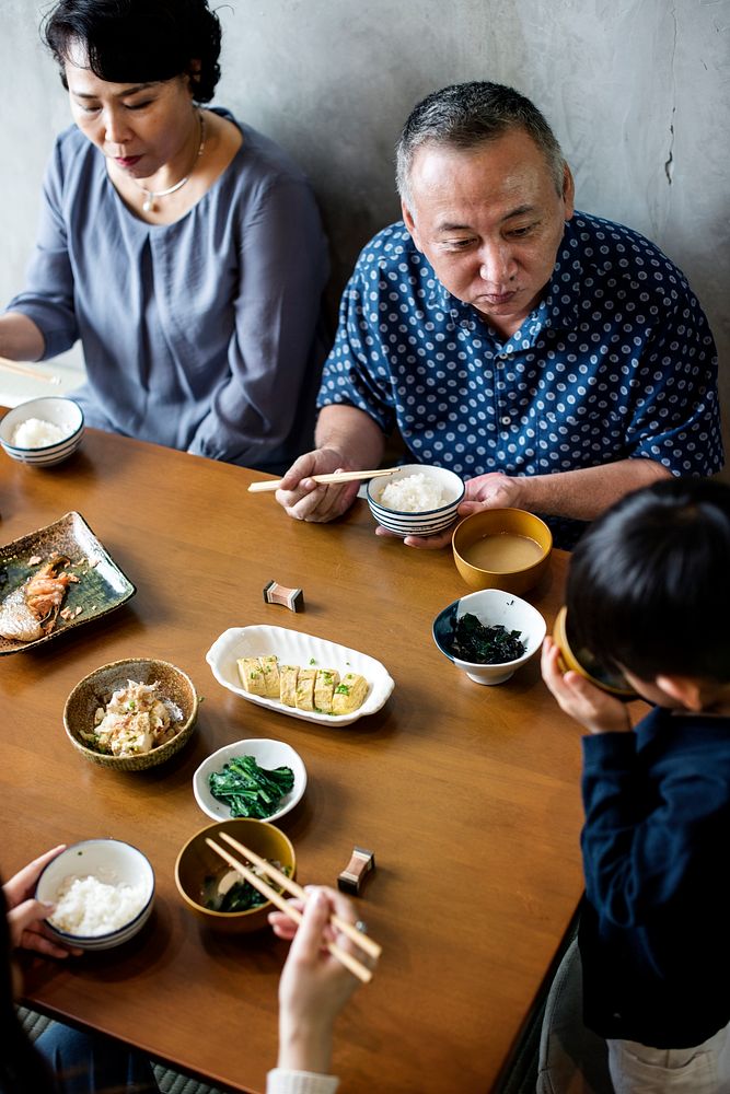 Japanese family dining together with happiness