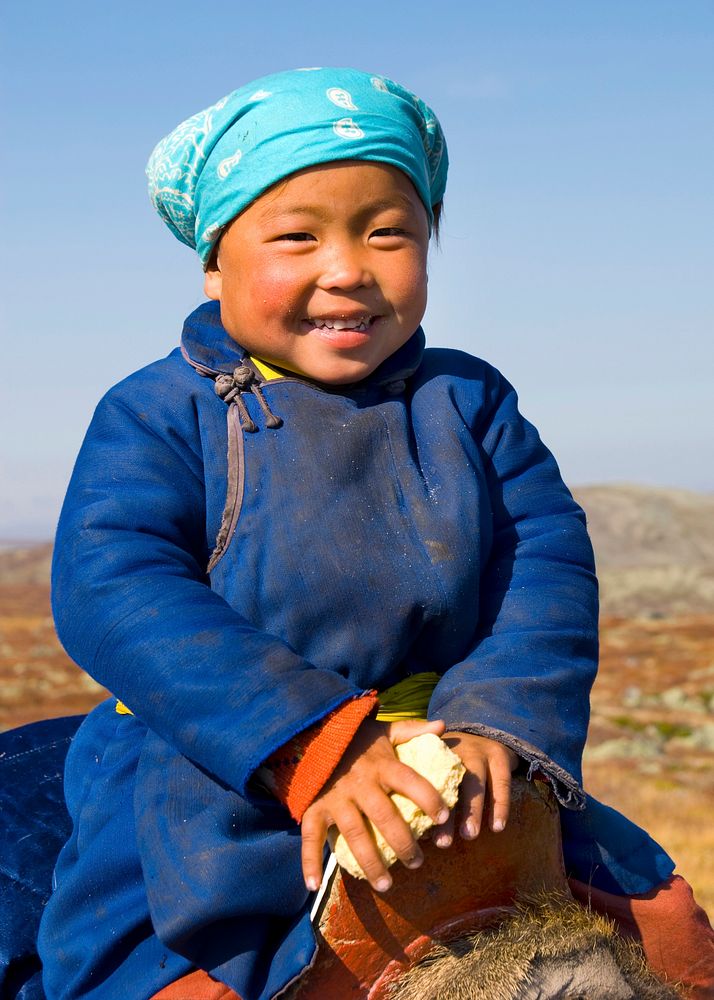Young Tsaatan girl with a beautiful smile (reindeer people), northern Mongolia.