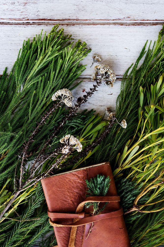 Leather-bound diary flowers