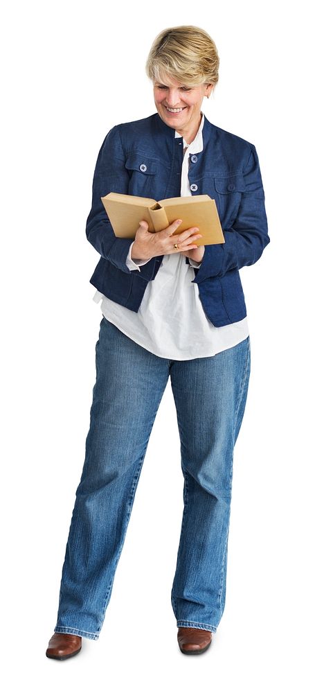 Casual adult woman standing reading a book
