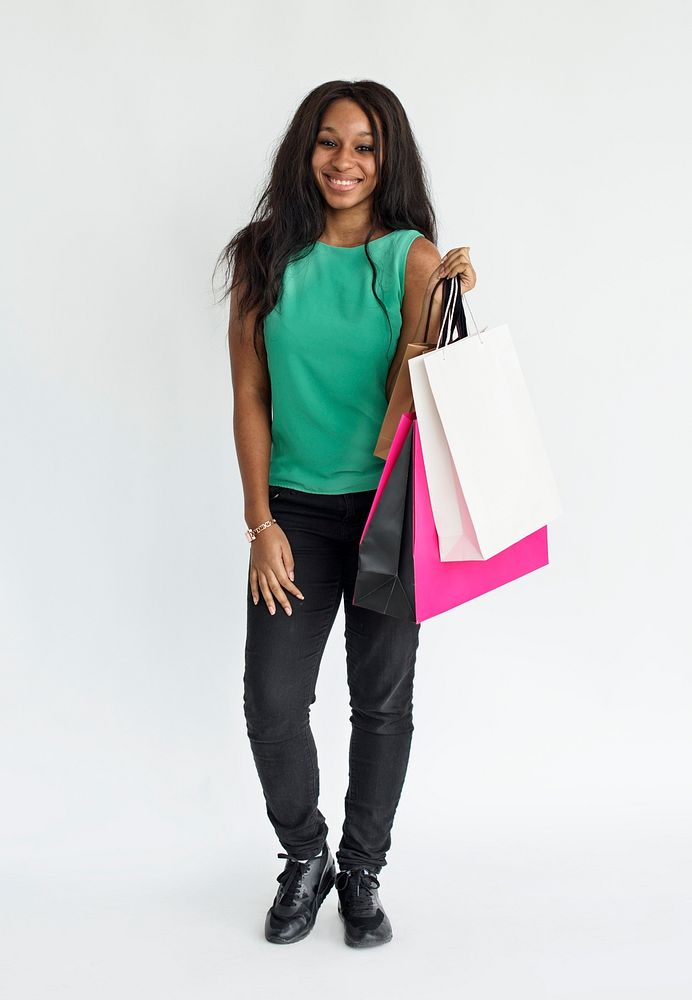 Black girl smiling full body shopping portrait