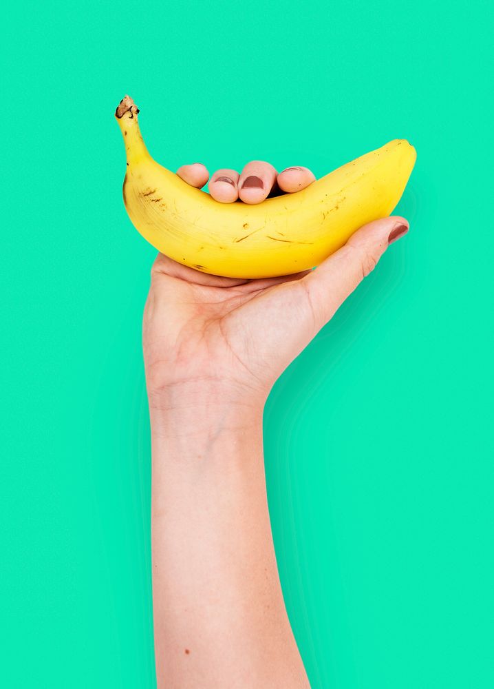 Hand Holds Banana Food Nutrition Concept
