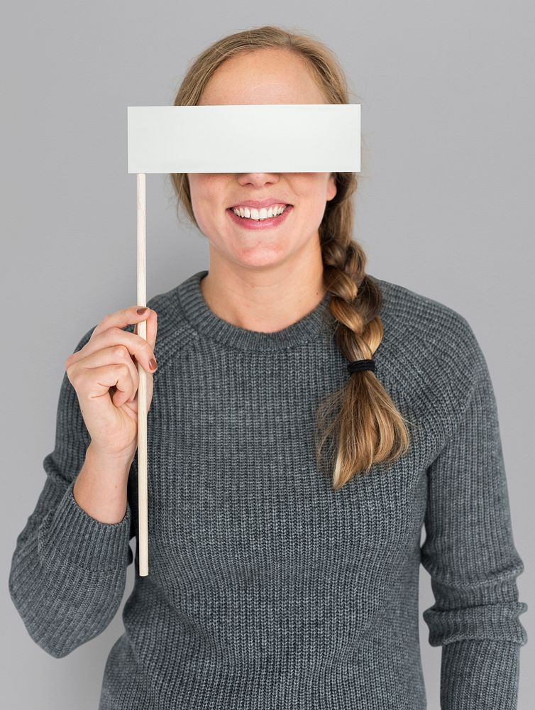 Caucasian Woman Holding Flag Covering Eyes